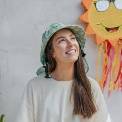 Plow Surf Co. | Gumnut Green Floral | Plow Surf Hat | Surfing Hat | Beach + Water Activity Headwear | -FCS Shop Buy Plow Surf Co Gumnut Green Floral Surfing Hat With Chin Strap Ladies 87634.1692943660