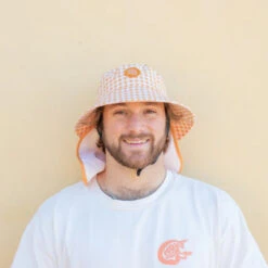 Plow Surf Co. | Orange Gingham | Plow Surf Hat | Surfing Hat | Beach + Water Activity Headwear | 10 Plow Surf Co. | Orange Gingham | Plow Surf Hat | Surfing Hat | Beach + Water Activity Headwear | -FCS Shop Buy Plow Surf Co Orange Gingham Surfing Hat With Chin Strap Mens 70252.1692946053
